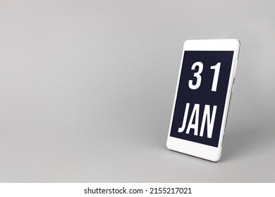 January 31st . Day 31 of month, Calendar date. Smartphone with calendar day, calendar display on your smartphone.  Winter month, day of the year concept