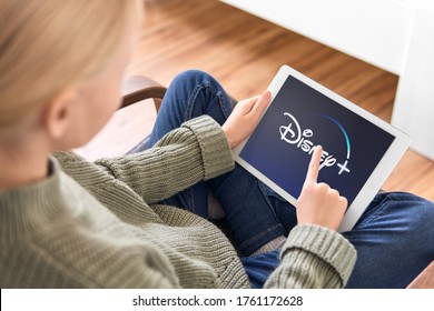 January 5, 2020, Kaliningrad, Russia. Young Girl Holding IPad In Her Hands With Disney Plus Application On The Screen. Disney Plus Is A Subscription Video On-demand Streaming Service