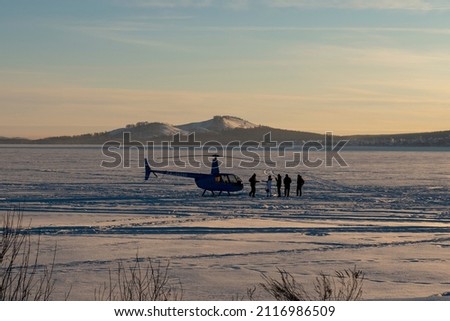 January 5, 2022 Lake Bannoe, Republic of Bashkortostan, Russia. Helicopter rides over winter nature