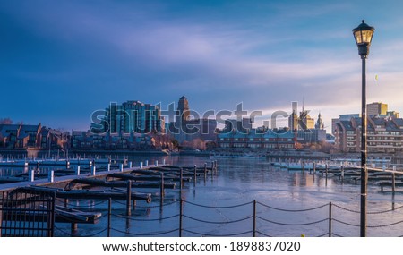 January 9th, 2021 -Buffalo NY USA: Buffalo cityscape view at early cold morning from erie basin marina.
