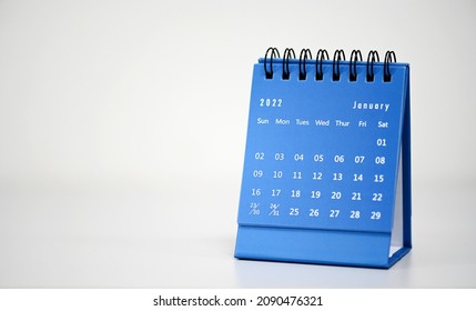 January Calendar 2022 on White table background.Time planning, day counting and holidays - Shutterstock ID 2090476321