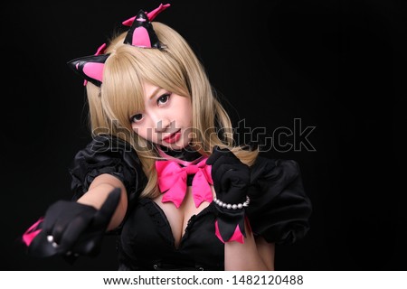 Japan anime cosplay , portrait of girl cosplay isolated in black background