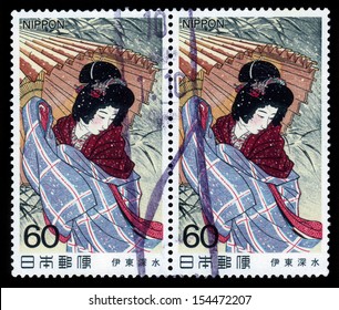 JAPAN - CIRCA 1983: A Stamp Printed In Japan Shows Young Woman In Kimono During A Snowstorm, Multicolor Woodcut, Yokohama Art Museum, Circa 1983