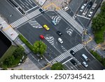 Japan City street Intersection Traffic cars and People walking footpath