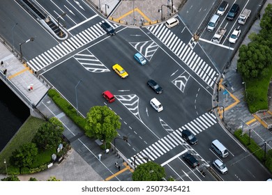 Japan City street Intersection Traffic cars and People walking footpath - Powered by Shutterstock