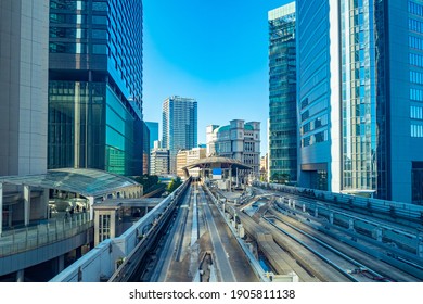 Japan. A complex system of transport routes in Tokyo. Transport of the Japanese capital. Tokyo road infrastructure. Road and business center of the city. Railway tracks near the houses. - Powered by Shutterstock