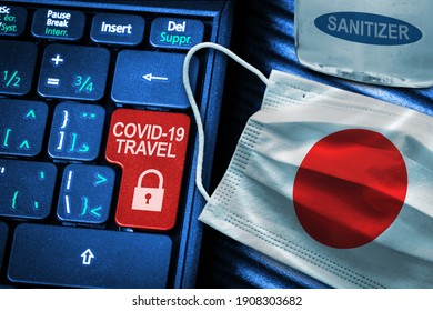 Japan COVID-19 Coronavirus Travel Restrictions Concept Showing Red Button Warning On Keyboard With Japanese Flag Face Mask And Hand Sanitizer. New Normal In Global Travel.