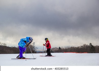 JAPAN - FEBRUARY 29: Father And Son Are Warm Skiing On February 29,2016 In Yeti Snow Town, JAPAN.  