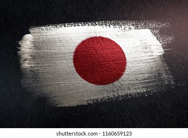 Japan Flag Made of Metallic Brush Paint on Grunge Dark Wall