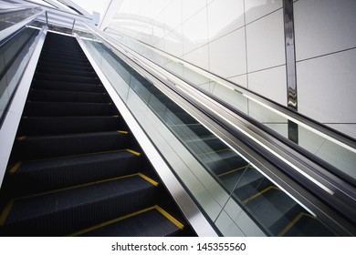 Japan Osaka JR Station man on top of escalator
