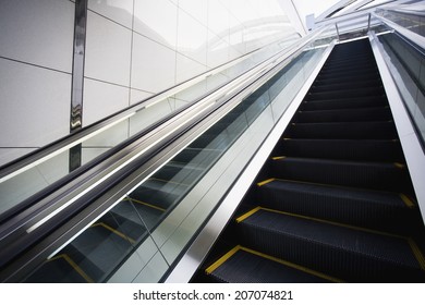 Japan, Osaka, JR Station, man on top of escalator