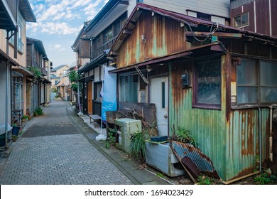 Japan. Streets of the Japanese city. Residential houses away from the city center. Modest homes in Japan. life in Japan. A narrow Japanese street. - Powered by Shutterstock