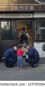 JAPAN, TOKYO - NOVEMBER 2016: An Unidentified Lost Child Seek Assistance From Local Police In Tokyo, Japan.