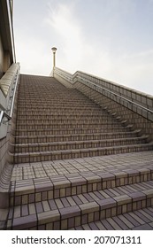 Japan, Tokyo, Ueno JR Station, man on top of steps