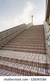 Japan, Tokyo, Ueno JR Station, man on top of steps