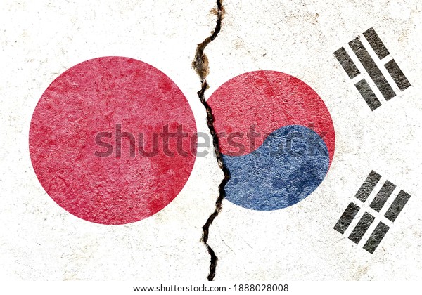 Japan VS South Korea national flags icon grunge\
pattern isolated on broken weathered cracked wall background,\
abstract Japan South Korea politics relationship crisis concept\
texture wallpaper