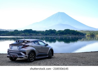 Japan Yamanashi Prefecture Lake Shoji, Mt. Fuji And Silver Car