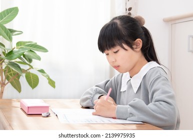 Japanese 6th Grade Girl Studying Alone