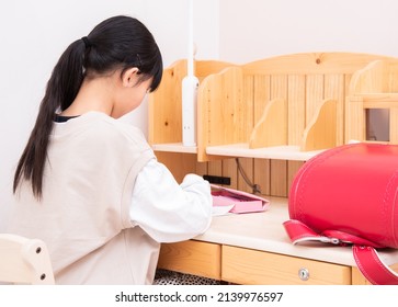 Japanese 6th Grade Girl Studying Alone