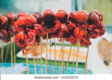 Japanese BBQ Grill Octopus Skewer Is Popular In Street Food At Fresh Market In Japan