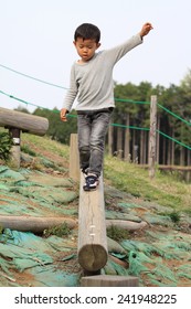 Japanese Boy On The Balance Beam