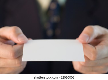 Japanese Business Custom Of Giving A Business Card With Two Hands