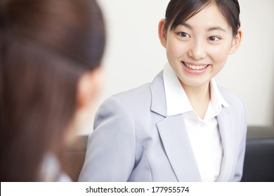 Japanese Businesswoman During The Meeting