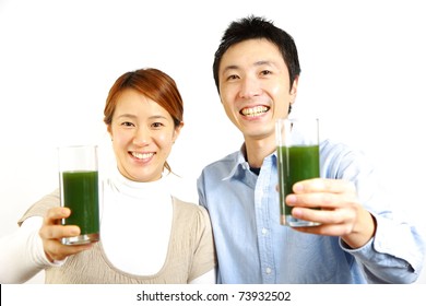 Japanese Couple Having Green Vegetable Juice