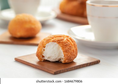 Japanese Cream Puff On Wooden Plate