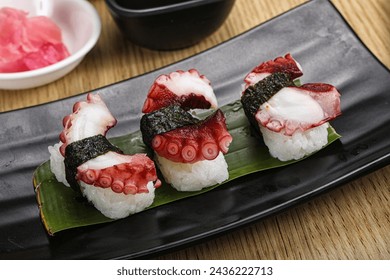 Japanese cuisine - sushi with octopus served ginger