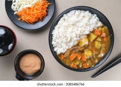 Japanese Curry Rice With Beef, Potatoes, Carrots And Onions In Spicy Yellow Curry Served With Steamed Rice