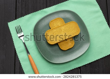 Japanese curry roux blocks, solid curry paste cubes for making traditional Asian savory stew, aromatic culinary ingredient.