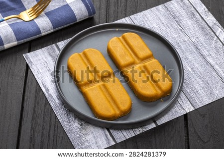 Japanese curry roux blocks, solid curry paste cubes for making traditional Asian savory stew, aromatic culinary ingredient.