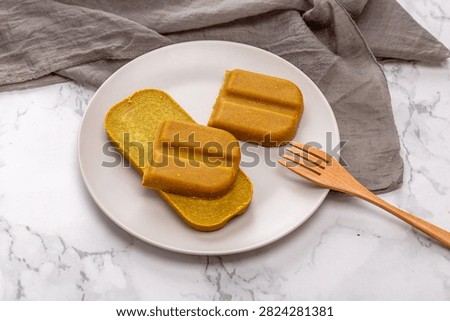 Japanese curry roux blocks, solid curry paste cubes for making traditional Asian savory stew, aromatic culinary ingredient.