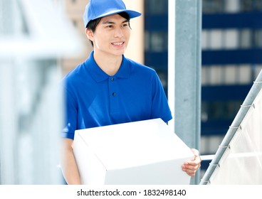 Japanese delivery man with luggage.