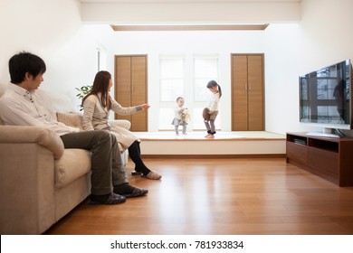 Japanese Families Relax In The Living Room