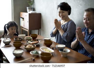 Japanese family dining together with happiness