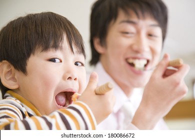 Japanese Father and son who having a meal