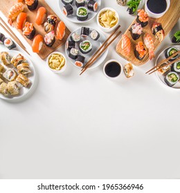 Japanese Food. Big Sushi Set. Assorted Set Of Various Sashimi, Maki And Sushi Rolls With Different Fillings - Tuna, Sea Bass, Salmon, Shrimp, Vegetables. Flatlay Copy Space