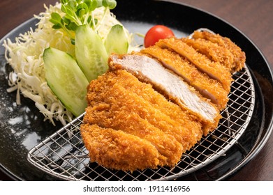 Japanese food called tonkatsu topped with delicious gravy or special tonkatsu sauce.