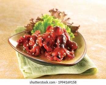 Japanese Food Chinmi Chuka Idako Seasoned Baby Octopus Closeup Stock Photo On Plate And Clean Background