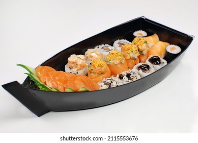 Japanese food combo of sushis and sahimis in white background