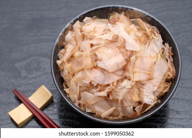 Japanese food, Katuobushi on cooked rice on black background