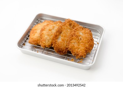 Japanese food, tonkatsu, Freshly fried pork cutlet on Aluminum tray On white background