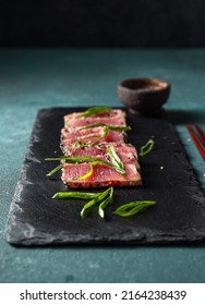 Japanese Food. Tuna Tataki. Raw Tuna Sashimi On Black Board