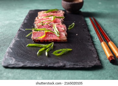 Japanese Food. Tuna Tataki. Raw Tuna Sashimi On Black Board