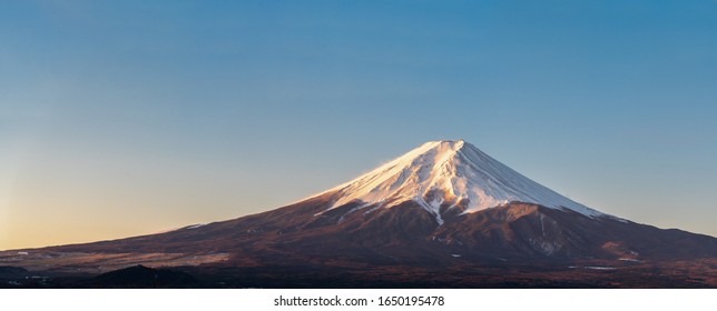 Japanese Fuji Mountain On Blue Sky With Copy Space.