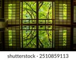 Japanese garden view with reflection and flowers, in Arashiyama Kyoto, Japan