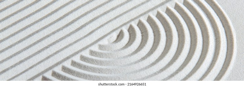 Japanese Garden With Yin Yang Stone In Textured Sand