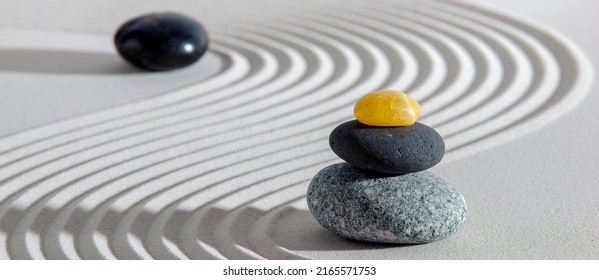 Japanese Garden With Yin Yang Stone In Textured Sand